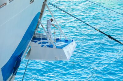 Crew working on a cruise ship– maritime industry insights