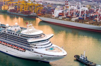 Luxury cruise ship proceed on sailing from port channel due on sunrise